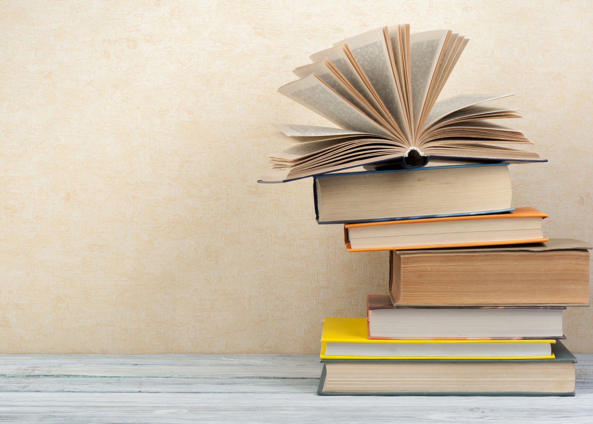 Books on a wooden table.